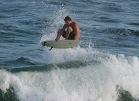 image: Ben Long goin' big with a clean double rail grab air before Tropical Storm Alberto makes landfall