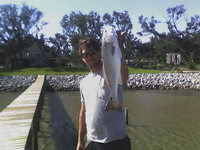 image: Jon Terhaar with slot-size redfish