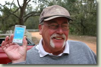 image: Mikey Sidebottom proudly displays BagTag #1