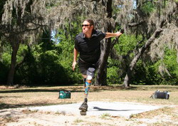 image: Rich Allen launches a big drive on hole #8 @ Limona DGC