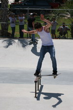 image: Team IL skater, Jesse Dillaha with a clean tailslide over the pyramid